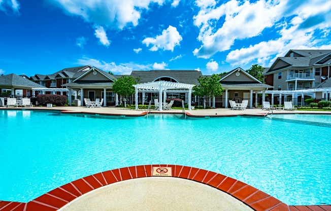 Exterior Pool view at apartment homes in Hampton Virginia