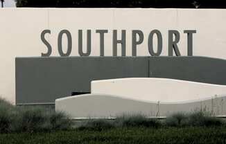 a sign for southport at the entrance to the city of southport