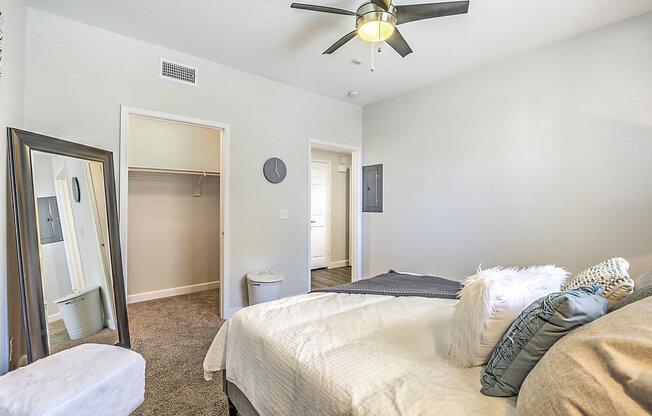 Discover comfort and style at The Michael B: plush carpet, walk-in closets, and ceiling fans for a cozy retreat.at The Michael B Townhomes and Flats, Las Vegas