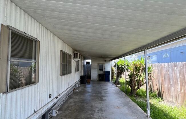 55+ Fair Lane Acres Community. 2 Bed, 2 Bath Mobile Home with 1-Car Carport. Close to Beaches & Nearby Attractions!