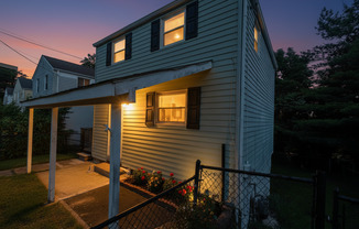 Quaint home with flexible layout, updated kitchen, and a private-feeling backyard in convenient Westwood