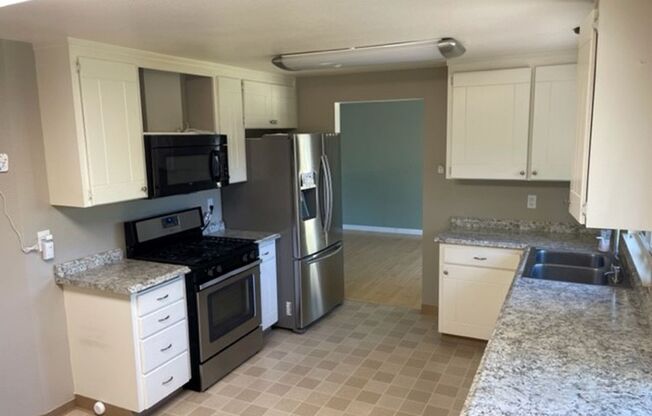 Beautifully Updated Home with Large Yard and in quite Great Neighborhood.