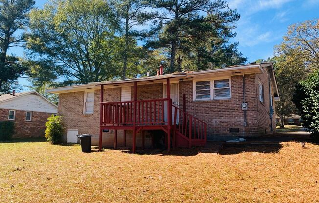 Beautiful hardwood flooring! 2 bed, 1 full bath plus office/possible 3rd bedroom, large kitchen, cooktop, newly renovated, parking for 2, deck, must see!