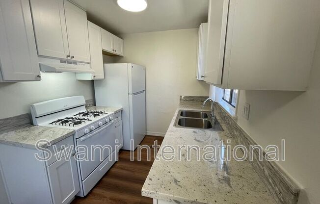 1102 W 92 ST