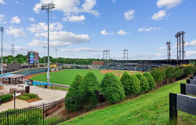 a view of a baseball field at a stadium at Link Apartments® Brookstown, North Carolina