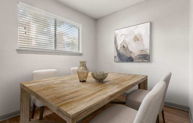 a dining room with a table and chairs at South Lamar Village, Austin, TX, 78704