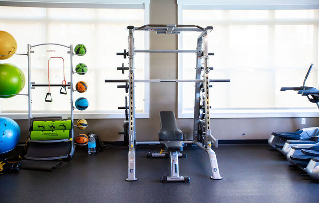 a gym with weights and other exercise equipment