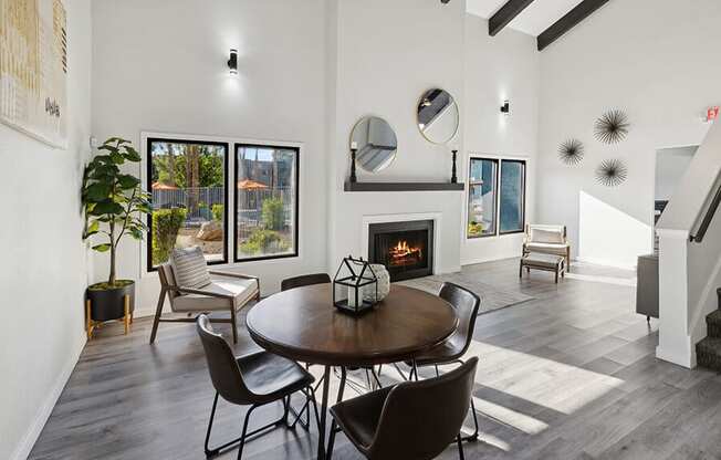 Community Clubhouse with Lounge Furniture and Fireplace at Tanque Verde Apartments located in Tucson, AZ.