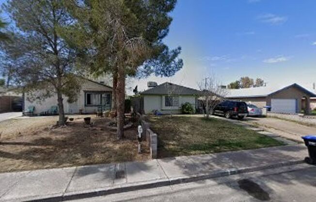 Single story home with RV Parking and huge lot.