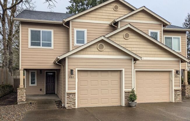 407 AND 409 MADRONA AVE SE