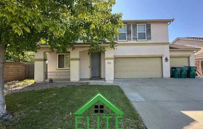Spacious 6-Bedroom Home with Two Master Suites in Desirable Stockton Neighborhood