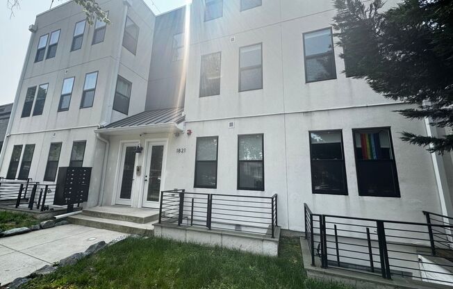 Discover this beautifully renovated 2BD/2BA FULLY FURNISHED condo in the vibrant Carver/Langston neighborhood