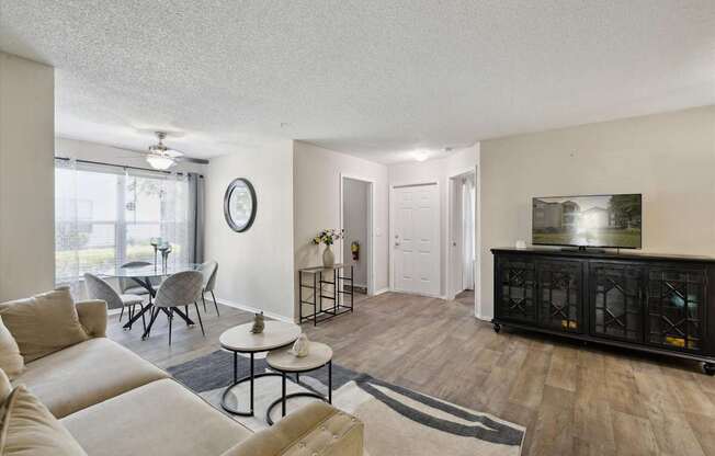 Spacious Living Area With Wood-Style Flooring