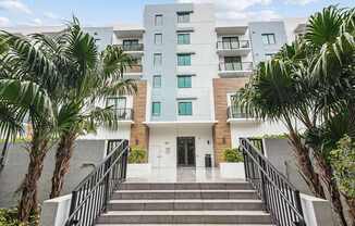 Steps leading to entryway in our midrise apartment community at Twenty2 West luxury apartments in Miami, FL