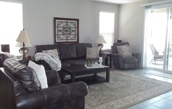Stunning Fully furnished home 3 bed 2.5 baths 2056 sq ft w/heated pool!!! Must see will rent fast!