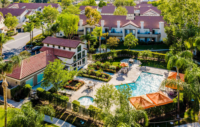 A large house with a pool in the backyard.