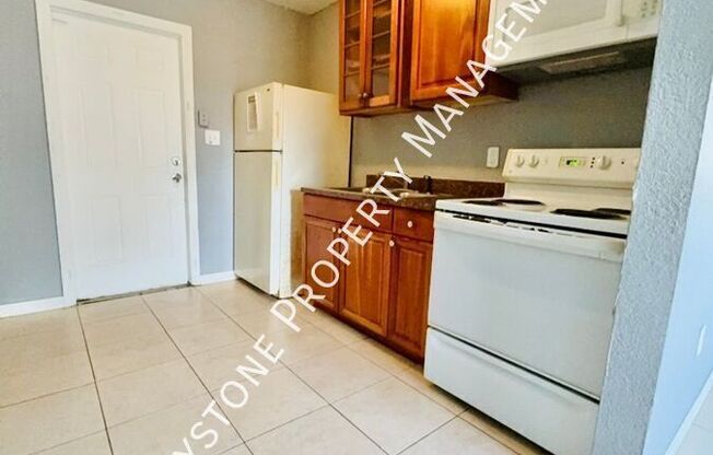 1409 E 108 AVE