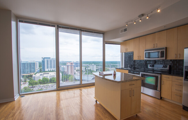 1 Bedroom Apartment w/ Beautiful View and Balcony overlooking Downtown!!