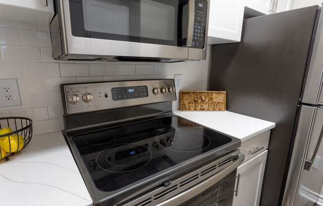 Stunning kitchen with sleek quartz countertops  at Wyndchase at Aspen Grove, Franklin, 37067