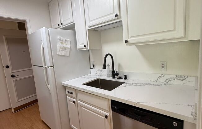 1 Bed, 1 Bath Condo in Prime Belmont Location