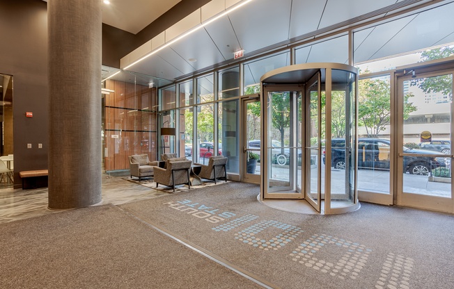 A hallway with a carpet that has the word