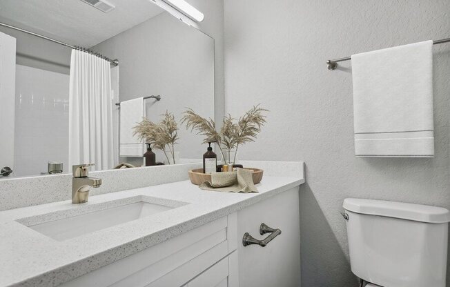 Model bathroom with white vanity