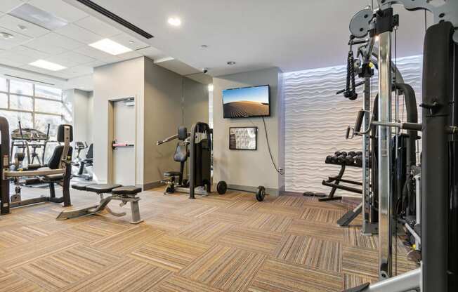 the gym at the flats at big tex apartments