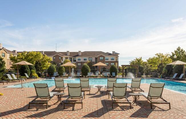Calming lounge area on pool sundeck at Avenues at Craig Ranch apartments for rent