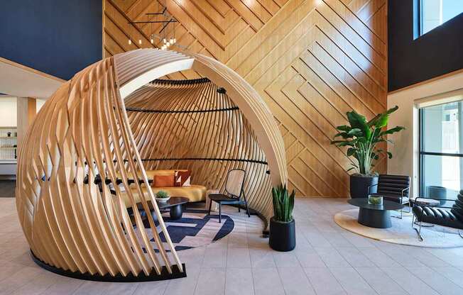 a large wooden structure in the lobby of a building