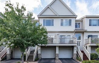 Like New 2 Bed/2 Bath Townhome With Amenities And Attached Garage