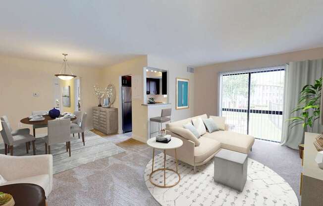 A well-lit living room with a dining area and kitchen in the background.