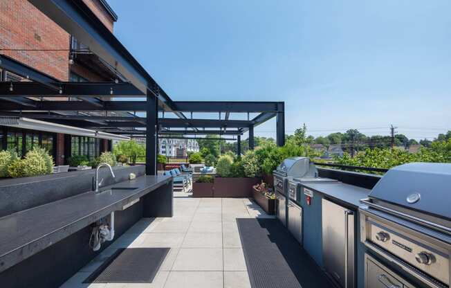 a kitchen with stainless steel appliances and a patio
