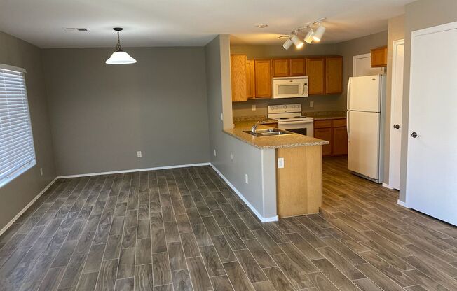 4 bedroom 2.5 bath home in Windmill Village is ready early July move-in !!