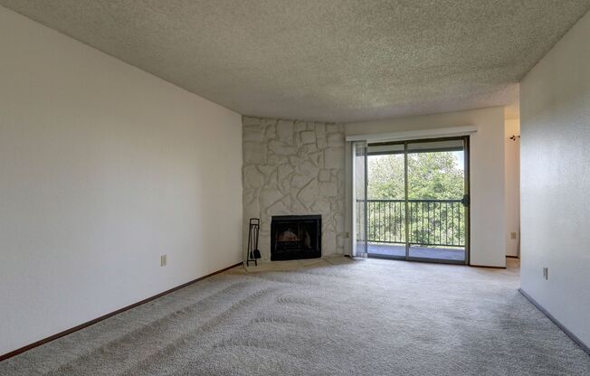 Clean Top Floor 1BR 1BA Condo with Wood Burning Fireplace