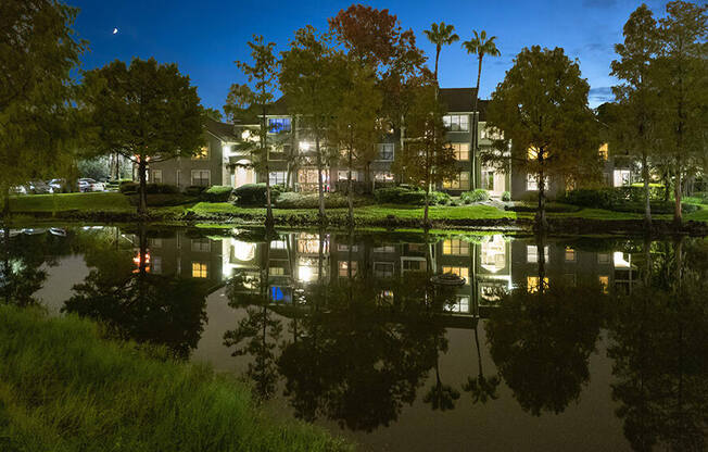 Community Pond with View of Exterior Building at Fountains at Lee Vista Apartments in Orlando, FL.