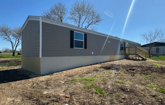 Move in June 10th 2025!! Beautiful 3 bedroom 2 bath w/Over 1/2 an acre