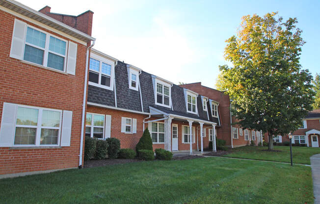 This is a photo of the grounds/building exteriors at Compton Lake Apartments in Mt. Healthy, OH.