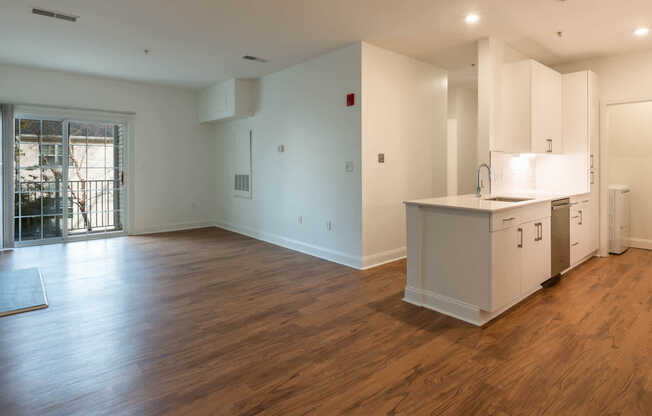 Living Room with Balcony and Hard Surface Flooring