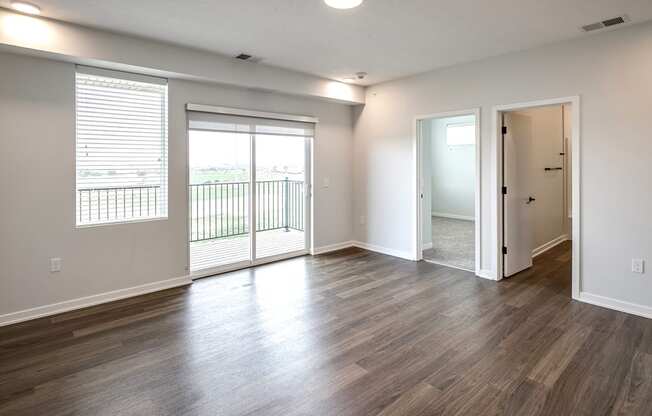 Studio, one two and three bedroom apartments and townhomes featuring open concept floor plans, dens, large windows, stainless steel appliances, quartz countertops, eat-in kitchens, pantries, LVT flooring and much more at The Trails at North Streams in Omaha, NE