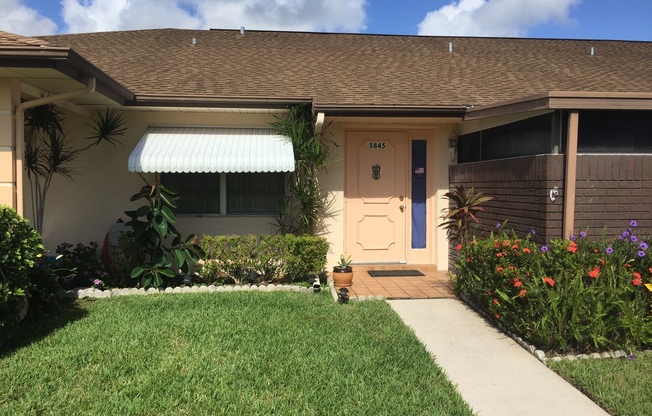 COMPLETELY RENOVATED 2 BEDROOM 2 BATH CONDO IN THE GROVE- 55+ GATED COMMUNITY IN FORT PIERCE
