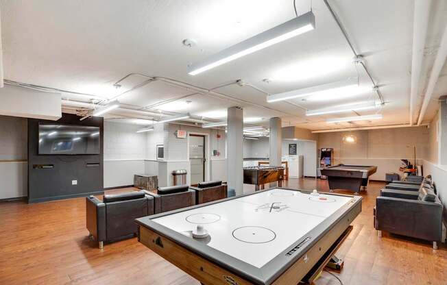 Game room with air hockey at Mason Hall in Alexandria, VA 22314