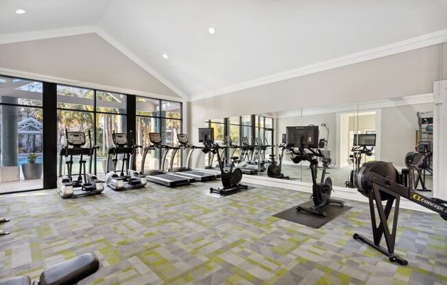 Indoor Fitness Center Treadmills and Stationary Bikes at Caribbean Breeze Apartments in Tampa, FL.