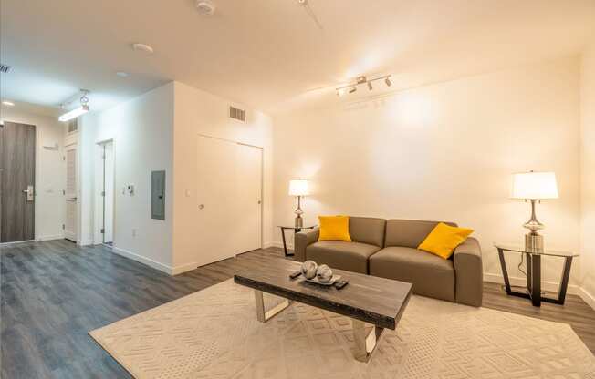 a living room with a couch and a coffee table