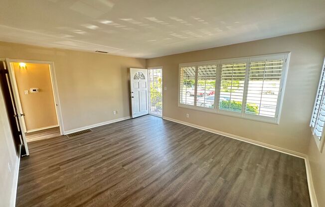 Beautiful La Mesa Home w/Garage, New Flooring, New Paint, Private Backyard Patio & Fenced Backyard.