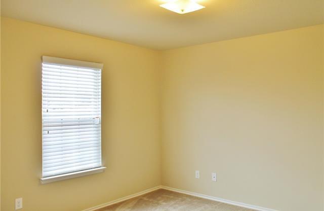 Chrarming 4/2/2 with Covered Patio in Royse City