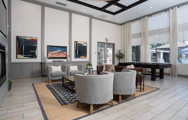 A living room with a grey sofa and a coffee table.