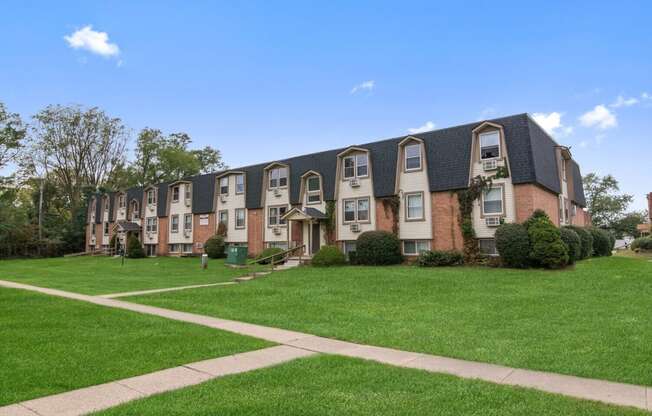 an image of a building with green grass in front of it