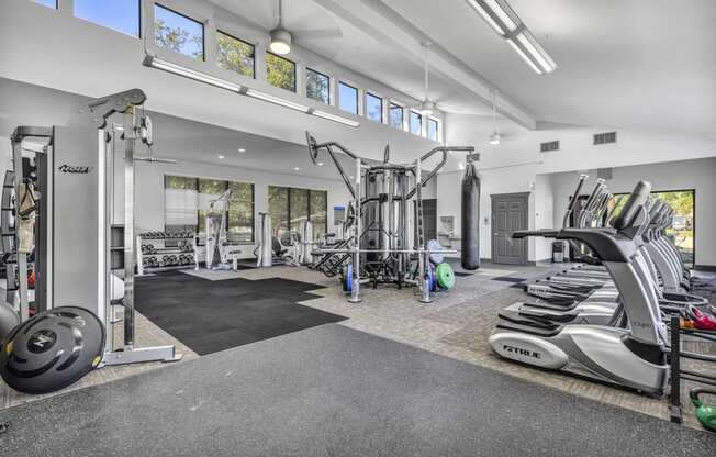 the gym is equipped with treadmills and other exercise equipment  at Sunset Ridge, San Antonio, TX