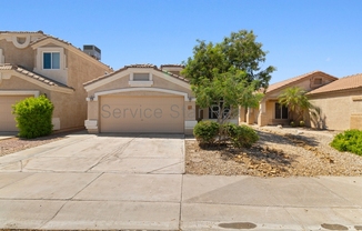 3039 E HONONEGH DR