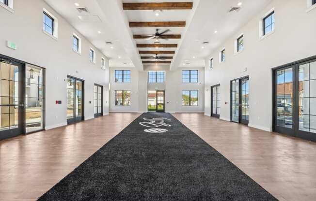 lobby with black carpet and windows at Stella, San Tan Valley Arizona